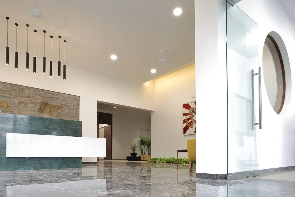 Lobby with marble floor and pendant lights