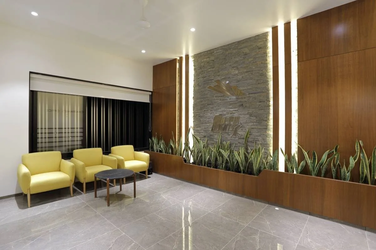 Lobby with stone feature wall and planters